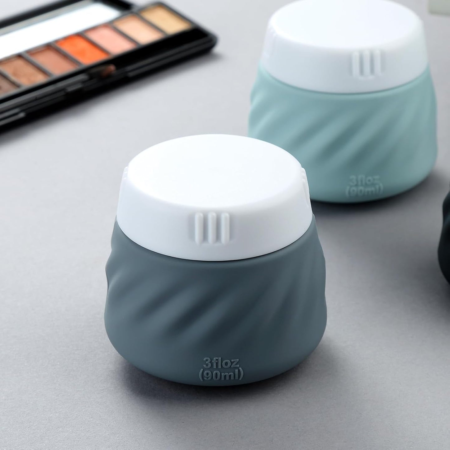 Gemice Silicone Cream Jars TSA Approved Travel Size Containers with Clear Bag, Leak-proof Travel Accessories with Lid for Cosmetic Face Body Hand Cream (4 Pack)